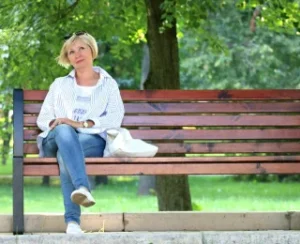 Woman-bench-stand-by-blonde-157622