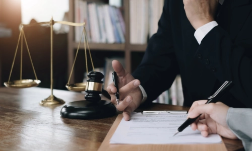 Essex County Alzheimer’s and Dementia Planning Lawyer discussing a document with a client